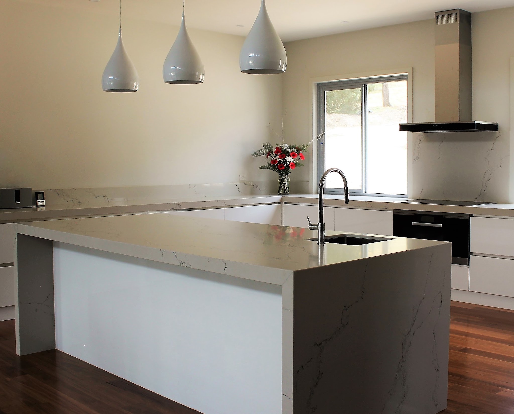 A kitchen built by Ararat Kitchens and Joinery with a stone waterfall island