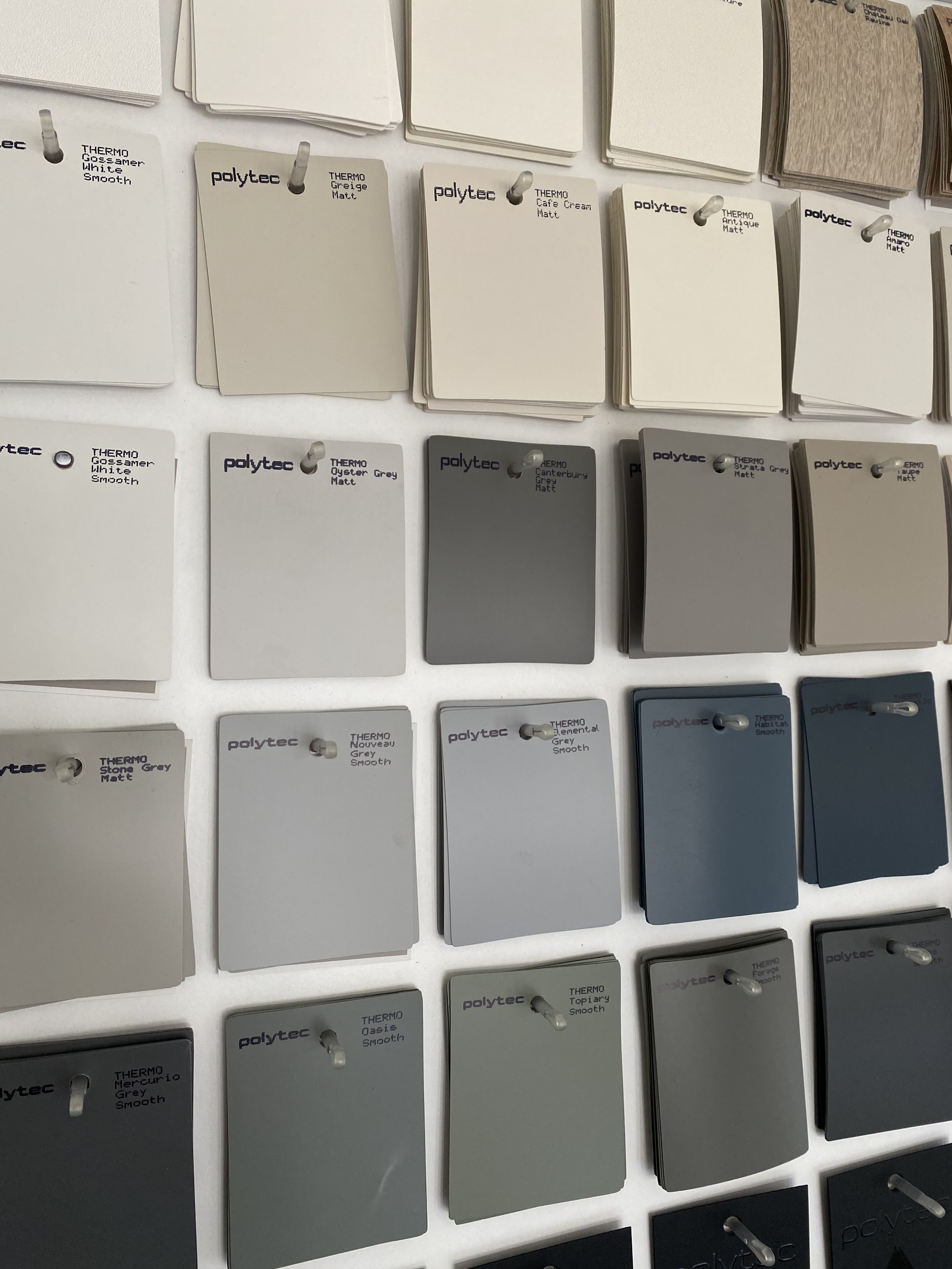 The showroom sample wall with dozens of door and colour samples
