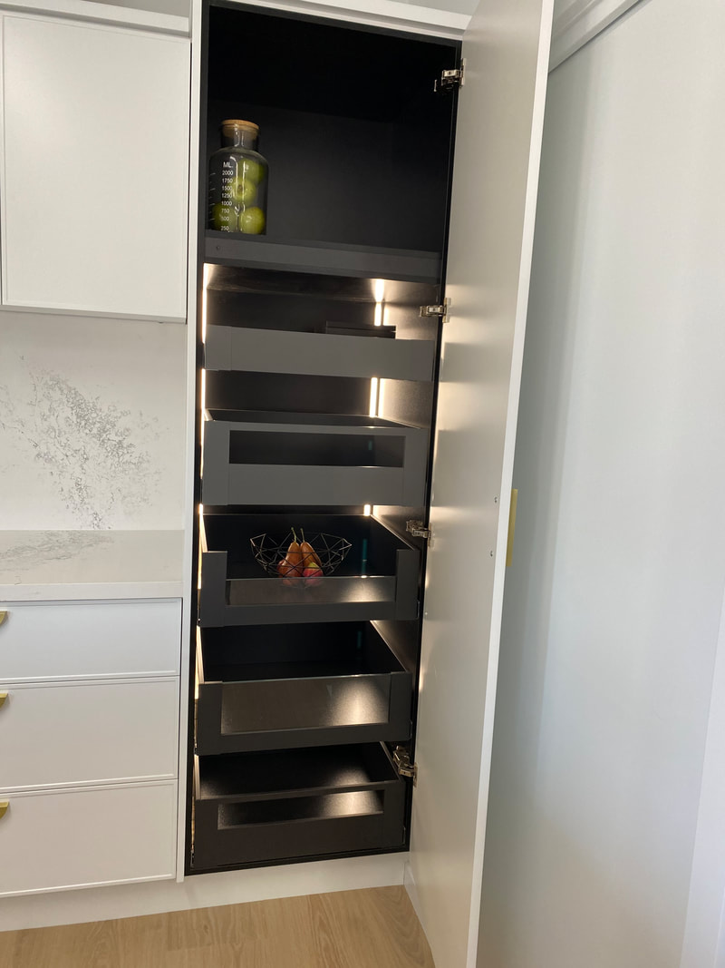 Black pull out pantry with internal drawers