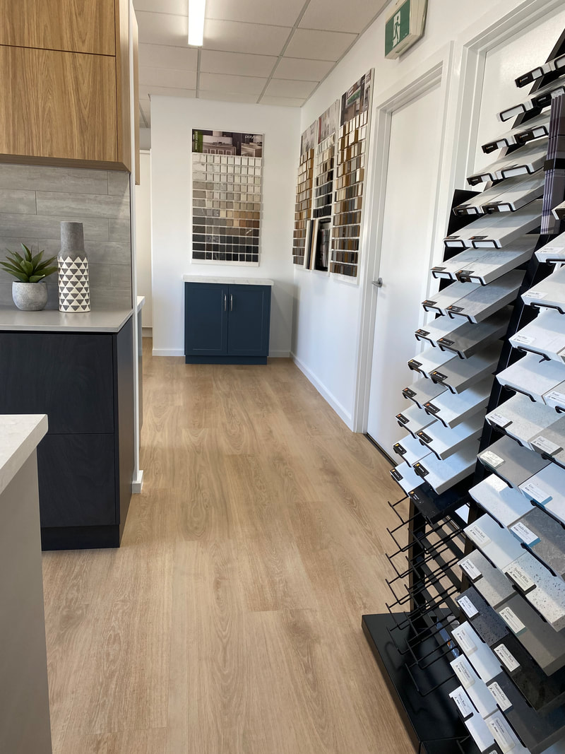 Inside the showroom with sample display racks